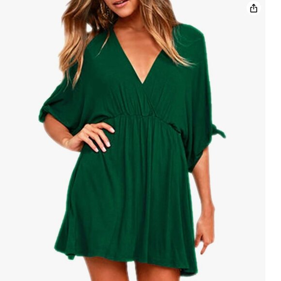 Vibrant Green Mini Dress with Sleek Design - Picture 1 of 9